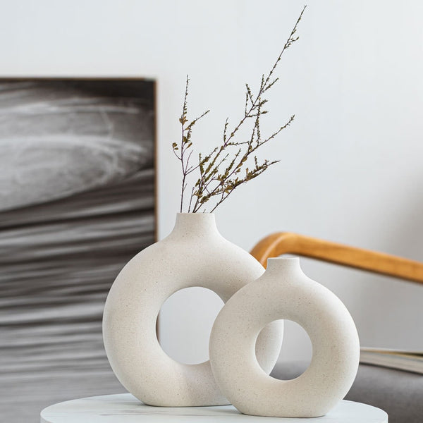 Circular donut shaped ceramic vases