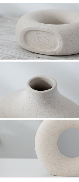 Circular donut shaped ceramic vases